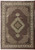 8'3" x 11' wool and silk Mahi rug with burgundy field, ivory border and central medallion