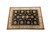 9'9" x 13'9" Oriental rug photographed at an angle showing black field and ivory border
