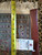 Measuring tape and inventory tag beside ivory fringe documenting hand-knotted pile and rug dimensions