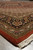 Angled corner shot of the wool and silk Oriental rug with serrated leaf border
