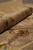 Rolled edge close up showing silk highlighted blossoms in rust, sage green and gold tones