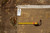 Back of rug with tape measure and hand woven Oriental rug tag marked 8.8 x 11.11