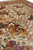 Chinese silk hunting rug field detail with horsemen, bowmen and running game across ivory ground