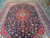 9'8" x 13'3" Kashan rug center medallion in red and ivory on navy floral ground