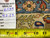 Reverse of the rug with inventory tag 6535, size 4.7 x 6.3, and measuring tape
