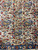 5x6 Persian Feraghan rug detail showing all-over boteh in blue, rust and gold on cream