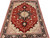 Wool and silk Persian rug seen from the end, geometric medallion and dense navy main border