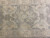 Overhead detail of all-over Oushak pattern with paired palmettes, rosettes and brown outlining