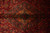 Overhead close-up of the 8'7 x 12'4 Kashan medallion in navy, gold and rust tones