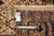 Rug back with tape measure and hand woven Oriental rug tag marked size 9 x 12