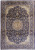 Navy blue 10x14 Persian Isfahan rug with ivory spandrels, gold floral medallion and scrolling vine border