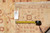 Reverse side with dealer tag reading PIX-4143 size 8 x 9.9 beside a measuring tape
