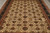 9'2" x 11'11" transitional rug field filled with palmettes, rosettes and scrolling vinework