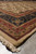 Low angle along the side border showing rust band, navy palmettes and beige field
