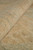 Rolled edge detail highlighting soft natural wool texture and subtle vegetable dye color variation