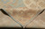 Rug folded back to reveal tight hand-knotted reverse side and neatly finished edge cords