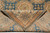 Folded back corner showing tight knotting, crisp pattern definition and cotton foundation weave