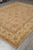 Full 8' x 10' Chobi rug shown at angle in neutral taupe and ivory tones