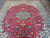 Room size 10x13 Persian rug from above showing balanced floral field and ivory spandrels