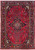Full overhead view of red Persian Lilihan rug with navy floral border and ivory medallion