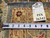 Reverse side with inventory tag PIX-26342 and tape measure across the tightly knotted wool back