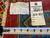 Back tags reading Pakistan hand made oriental rug 100% woolen with tape measure verification
