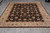 8' x 10'3" Afghan hand-knotted wool rug lies flat with cream fringe and beige floral border