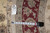 Back tag marked F4049 with tape measure confirming the 8 x 8 round size