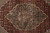 Detail of rosette medallion core showing ivory, sage and rust knotting with fine silk highlights