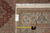 Back tag reading F-3068 with tape measure against the sage border and ivory fringe edge