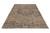 Angled view of a faded brown and charcoal 8x10 Heriz rug showing corner spandrels