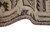 Folded edge of the low pile vintage 8x10 rug with brown border and ivory fringe