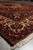 Perspective view down the ivory border of this 9 x 12 tribal Persian Bakhtiar rug