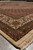 Low angle along the border of the 8'3 x 11 wool and silk Mahi rug