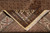 Folded corner showing the back, knot density, hand-wrapped selvage and cream cotton fringe