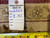 Back tag marked rug number 6522 beside a tape measure over the woven foundation