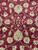 8x10 wool rug detail with cream rosettes, sage vines and deep wine red ground