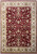 Burgundy 8x10 hand-knotted wool rug with ivory floral border and all over vine design