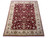 8 x 10 Indian hand-knotted rug photographed at an angle, burgundy field and ivory border