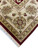 Ivory border corner with green and gold palmettes, burgundy edge and hand-tied white fringe