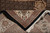 Folded corner revealing fine weave density, black selvedge and hand-tied ivory cotton fringe ends