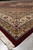 Low angle along the fringed edge showing layered borders and wool and silk sheen
