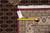 Back tag and tape measure confirming size on this hand knotted wool and silk rug