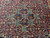 Vintage 1970s Persian rug field filled with repeating garden compartments in navy, red and ivory