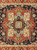 9x12 Serapi rug detail with green vinework, ivory palmettes and layered navy coral blocks