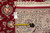 Back tag marked 9'1" x 12'2" with tape measure confirming size of this hand-knotted rug