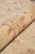 Rolled edge revealing dense wool pile depth and the soft handle of this new rug