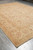 Living room size 9 x 12 Ziegler rug angled to show light gold and green tones