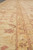 Perspective along the inner guard stripe showing fine knotting and gently abrashed honey gold tones