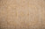 Large lobed palmettes and scrolling vines rendered in honey gold on a sand colored ground